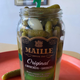 When you pull on the pickle elevator tab, pickles are brought to the top without their juice. Heroic.